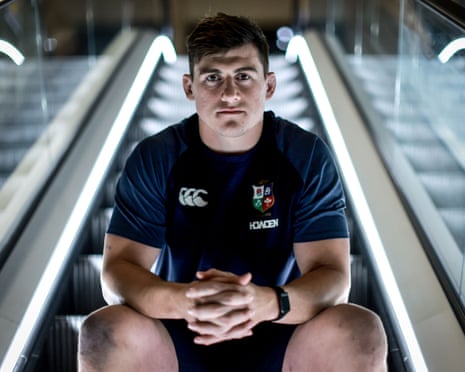 Dan Sheehan poses for a photo on an escalator in Perth as the Lions train in Australia